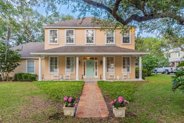 view of front of home with a front lawn