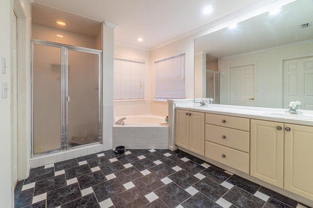 bathroom featuring vanity, crown molding, and independent shower and bath