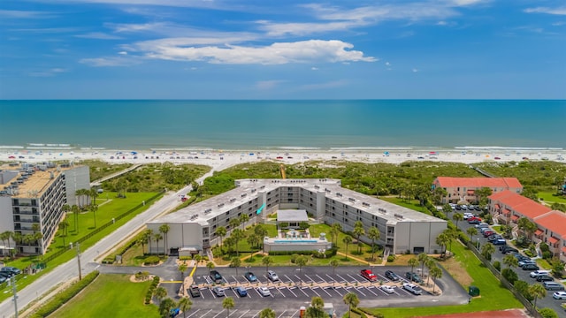 aerial view with a beach view and a water view