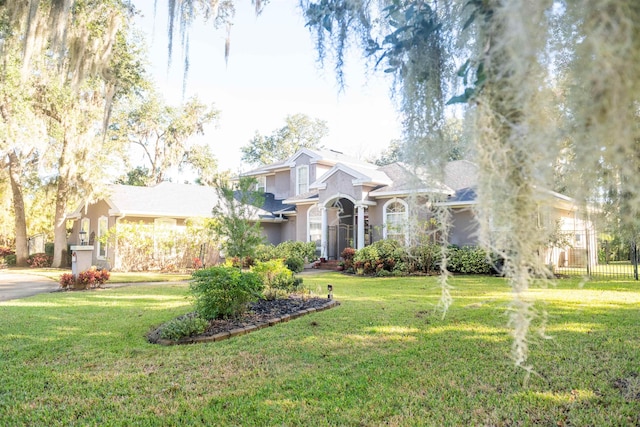 front of property featuring a front lawn