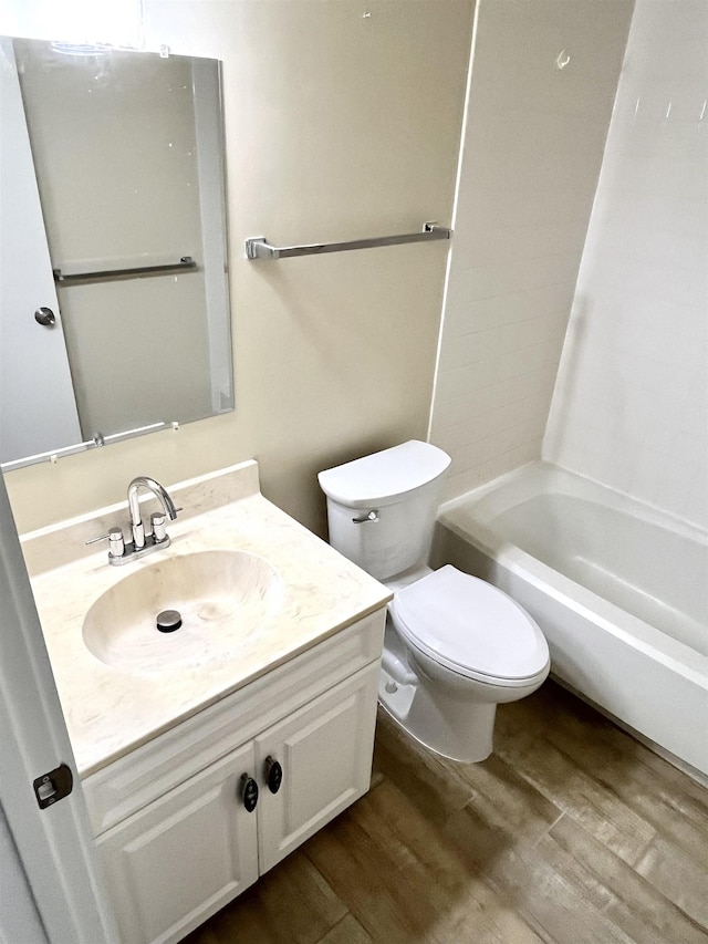 9 Alcira Ct, Saint Augustine, FL 32086 - full bathroom with toilet, shower / tub combination, wood finished floors, and vanity