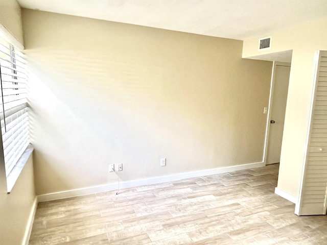 9 Alcira Ct, Saint Augustine, FL 32086 - empty room with baseboards, visible vents, and light wood finished floors