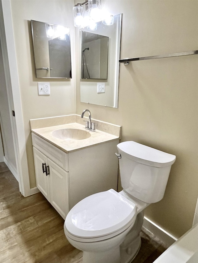 9 Alcira Ct, Saint Augustine, FL 32086 - bathroom with toilet, vanity, and wood finished floors