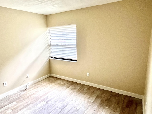 9 Alcira Ct, Saint Augustine, FL 32086 - unfurnished room with baseboards and wood finished floors