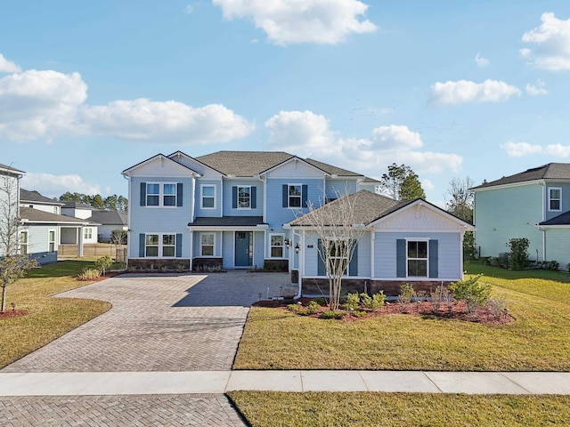 view of front of property with a front lawn