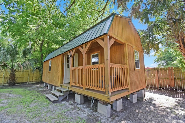 view of outbuilding with a fenced backyard