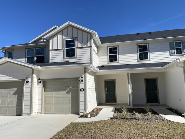 view of front of home featuring a garage and a porch