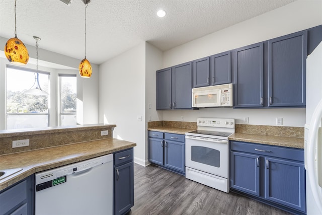 kitchen featuring blue cabinets, dark wood-type flooring, a textured ceiling, white appliances, and hanging light fixtures