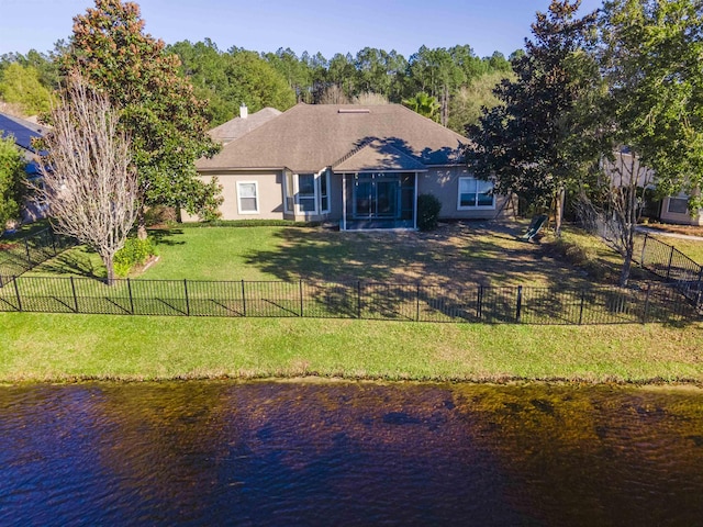 145 Whisper Ridge Dr, Saint Augustine, FL 32092 - back of property featuring a water view, a fenced backyard, and stucco siding