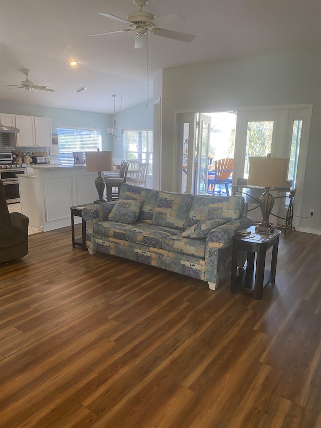 living room with dark wood finished floors and ceiling fan