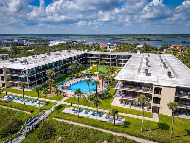 birds eye view of property featuring a water view