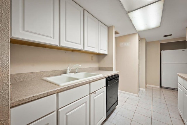 kitchen with dishwasher, white refrigerator, white cabinets, and sink