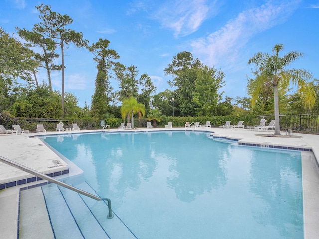 view of pool featuring a patio