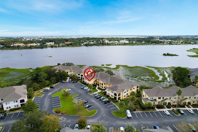 drone / aerial view featuring a water view