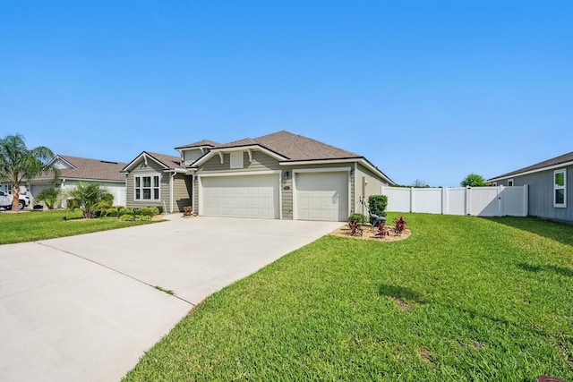 view of front of house featuring an attached garage and driveway