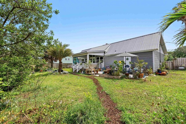 6600 Nassau St, Saint Augustine, FL 32080 - rear view of house featuring metal roof