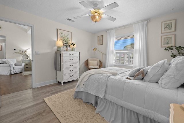 6600 Nassau St, Saint Augustine, FL 32080 - bedroom featuring light wood-type flooring, baseboards, and a ceiling fan
