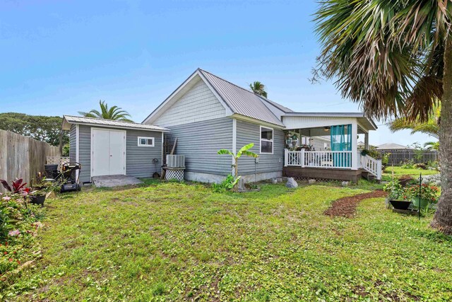6600 Nassau St, Saint Augustine, FL 32080 - rear view of house featuring metal roof