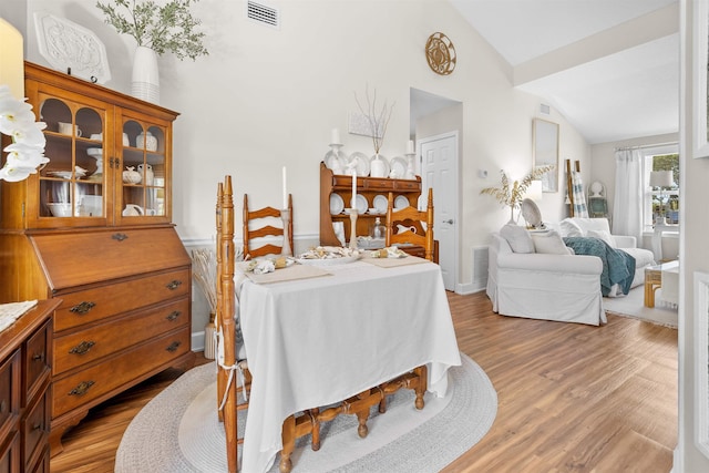 6600 Nassau St, Saint Augustine, FL 32080 - dining room with vaulted ceiling and light wood-style floors