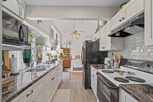 6600 Nassau St, Saint Augustine, FL 32080 - kitchen featuring range with electric stovetop, under cabinet range hood, a sink, light wood finished floors, and ceiling fan