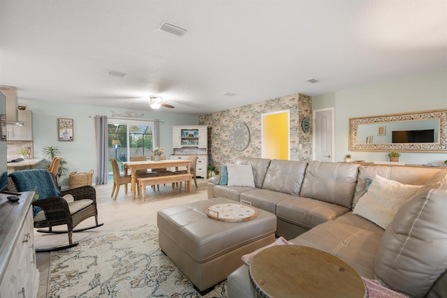 living room with ceiling fan