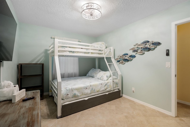 bedroom with a textured ceiling