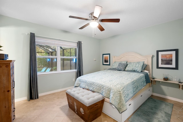 tiled bedroom featuring ceiling fan