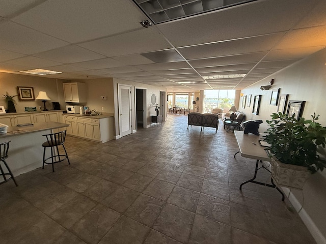 interior space with a drop ceiling