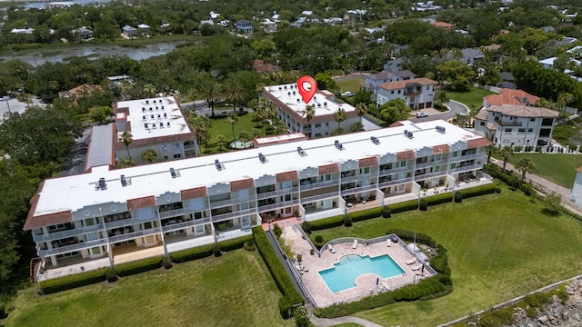 155 Marine St Unit 202, Saint Augustine, FL 32084 - drone / aerial view of a pool and a nearby body of water