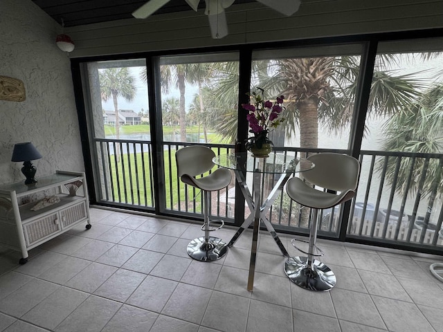 59 Village Del Lago Cir Unit 59, Saint Augustine, FL 32080 - sunroom / solarium featuring tile patterned floors and a water view