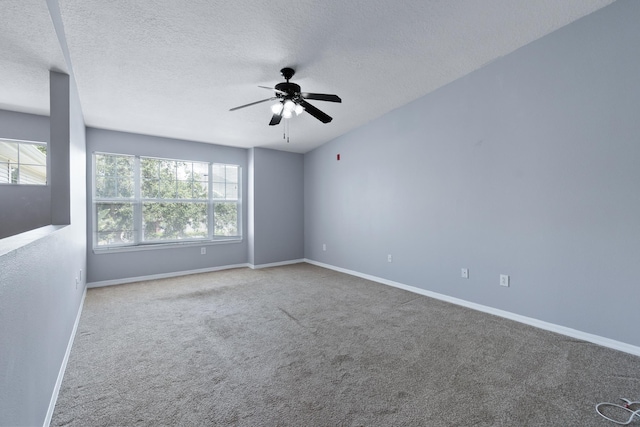 21211 Harbour Vista Cir, Saint Augustine, FL 32080 - carpeted empty room with ceiling fan and a textured ceiling