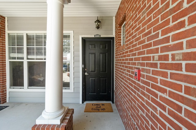 21211 Harbour Vista Cir, Saint Augustine, FL 32080 - property entrance featuring a porch and brick siding