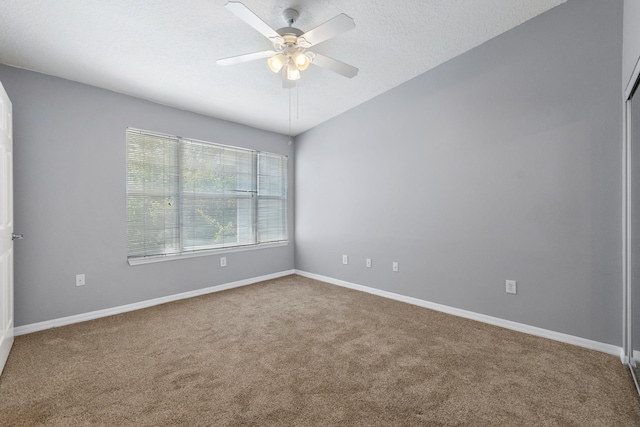 21211 Harbour Vista Cir, Saint Augustine, FL 32080 - carpeted spare room with a ceiling fan and a textured ceiling