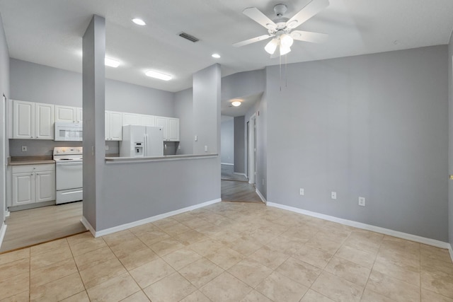 21211 Harbour Vista Cir, Saint Augustine, FL 32080 - kitchen with white appliances, ceiling fan, white cabinetry, high vaulted ceiling, and recessed lighting