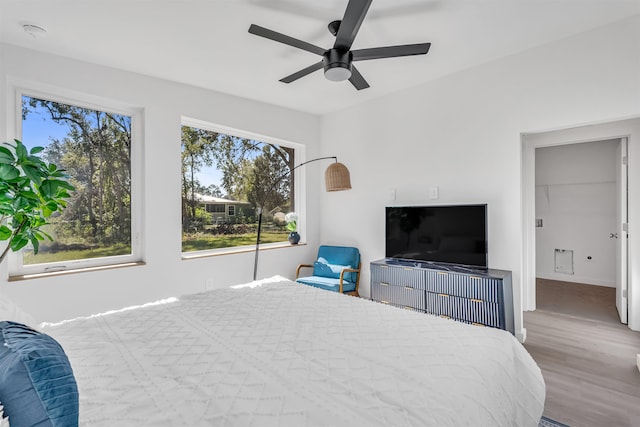 bedroom featuring wood-type flooring and ceiling fan