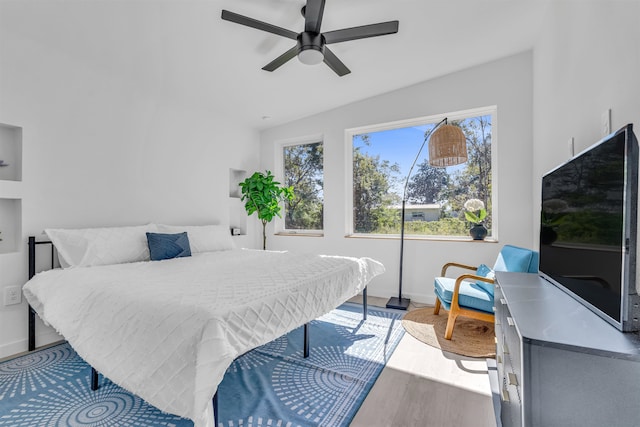 bedroom featuring ceiling fan and light hardwood / wood-style floors