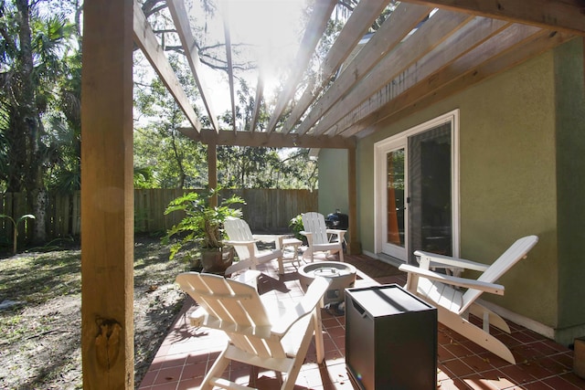 5 Nesbit Ave, Saint Augustine, FL 32084 - fenced backyard featuring a patio and a pergola