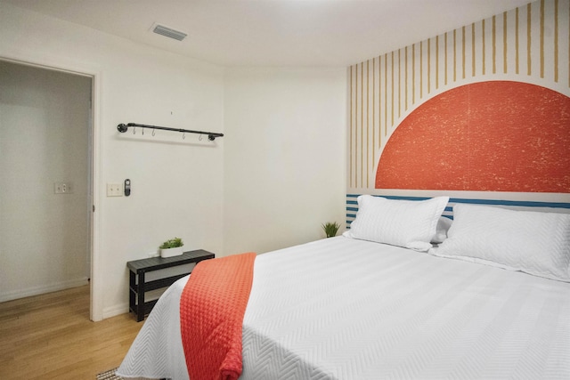 5 Nesbit Ave, Saint Augustine, FL 32084 - bedroom featuring wood finished floors and wallpapered walls