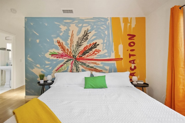 5 Nesbit Ave, Saint Augustine, FL 32084 - bedroom with wood finished floors and connected bathroom