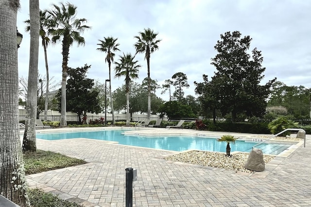 view of pool featuring a patio