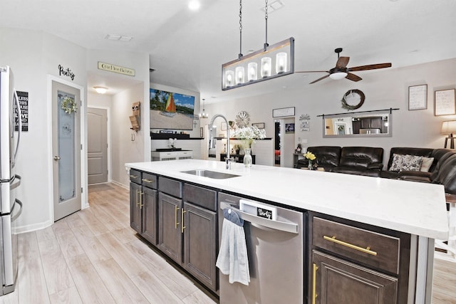 362 S Hamilton Springs Rd, Saint Augustine, FL 32084 - kitchen featuring a sink, stainless steel dishwasher, open floor plan, and light countertops