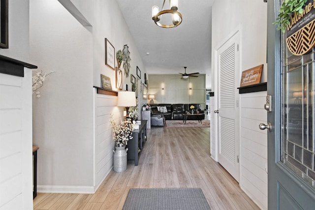 362 S Hamilton Springs Rd, Saint Augustine, FL 32084 - foyer featuring light wood-style floors, a ceiling fan, a chandelier, and baseboards