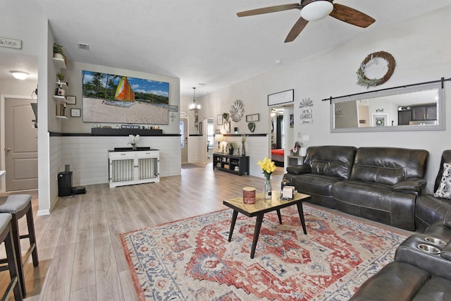 362 S Hamilton Springs Rd, Saint Augustine, FL 32084 - living area with a ceiling fan, wood finished floors, and a wainscoted wall