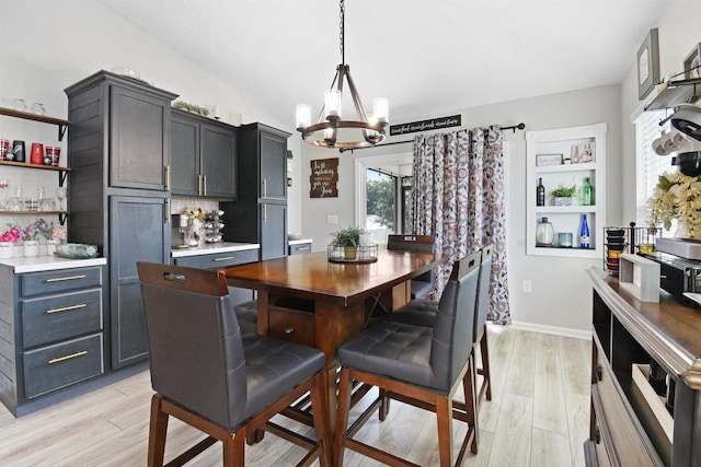 362 S Hamilton Springs Rd, Saint Augustine, FL 32084 - dining area with a chandelier and light wood-style floors