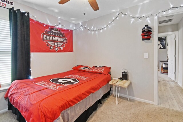 362 S Hamilton Springs Rd, Saint Augustine, FL 32084 - carpeted bedroom with baseboards and a ceiling fan