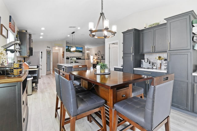 362 S Hamilton Springs Rd, Saint Augustine, FL 32084 - dining room with a chandelier, recessed lighting, and light wood-type flooring