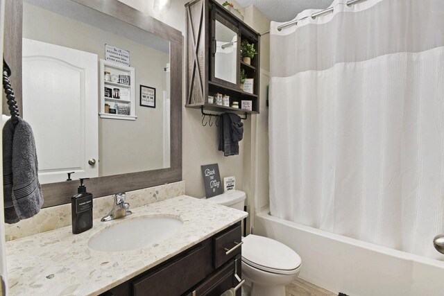 362 S Hamilton Springs Rd, Saint Augustine, FL 32084 - full bathroom with toilet, shower / tub combo with curtain, and vanity