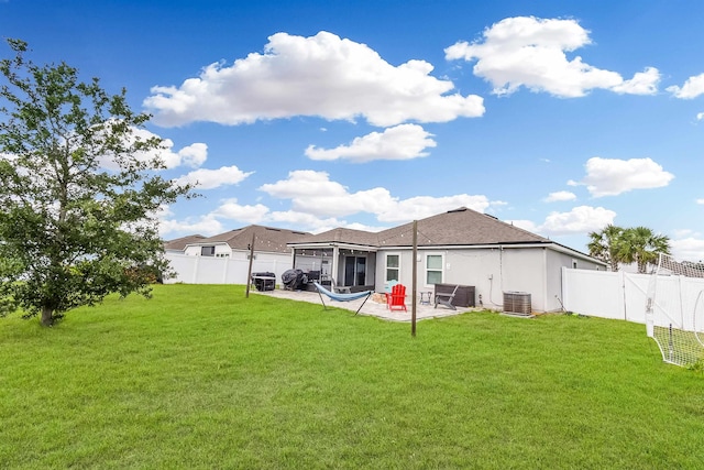 362 S Hamilton Springs Rd, Saint Augustine, FL 32084 - rear view of house with a patio area, central air condition unit, and stucco siding