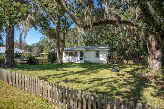 view of front of home with a front yard