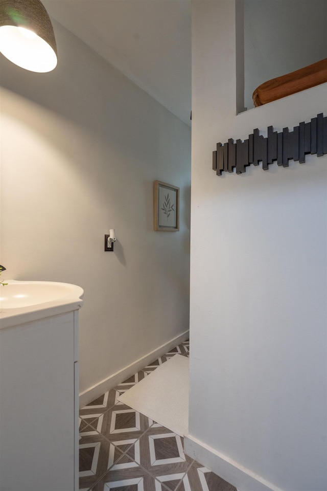 bathroom with tile patterned flooring